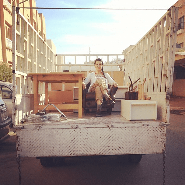 gasper the truck driver } sitting in the truck