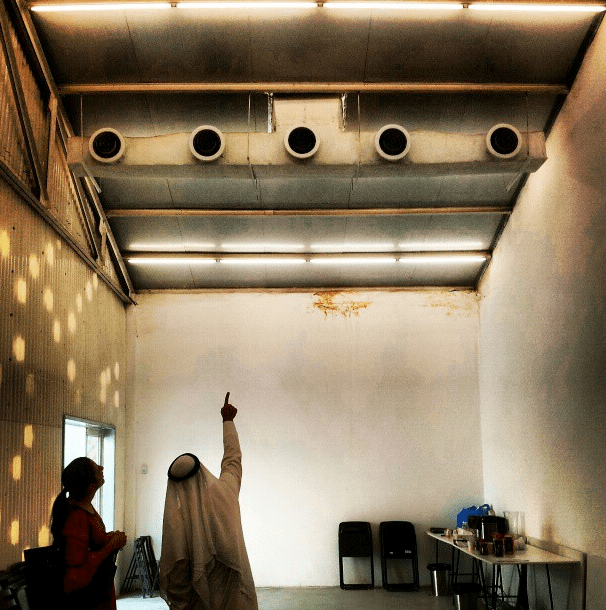 yasmine alkandari } crunch time. discussing some technicalities with ali abulhasan of the arabana project