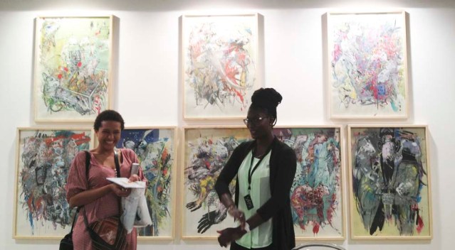 i have to admit i only took this photo because of the hip ladies. see? it's these distractions that makes the fair feel like a bazaar rather than a proper venue for displaying artwork