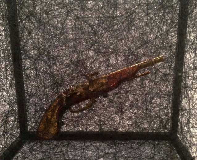 pistol. i don't think i can ever tire of seeing objects swallowed whole by shiota's carnivorous string