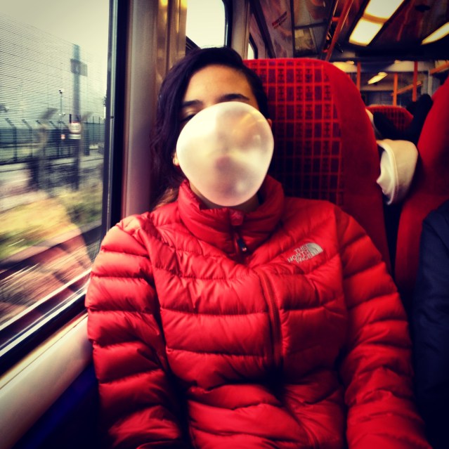 on the train ride back, a girl and her giant bubble