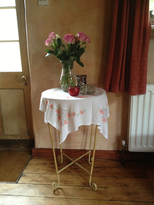 this is where i'd like rose to be, on this wall. gorgeous fresh flowers from the garden and votive candles would make great company for rose