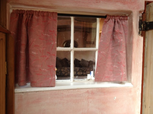 this little spy hole behind the door