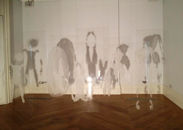 too soon after the comfort of my room, i was at the mosaic rooms with tim. this is a work by shada safadi, 'promises'. i love the shadow play. i'm always intrigued by shadows and reflections