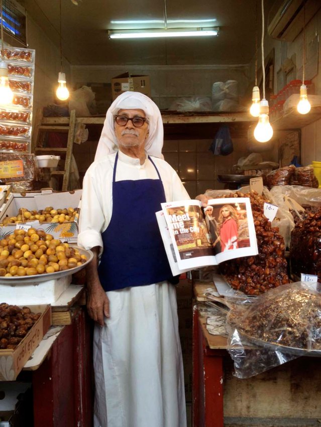 mr. date man and a photo of him and a model in the avenues magazine