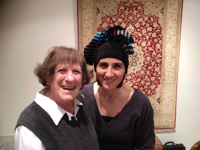 this is aunty ilham and me the day she gave me those very special tights. i was already wearing tights that day so figured they'd look great on my head. so technically, i did have headgear on last night, but on my legs. or is it the other way around?