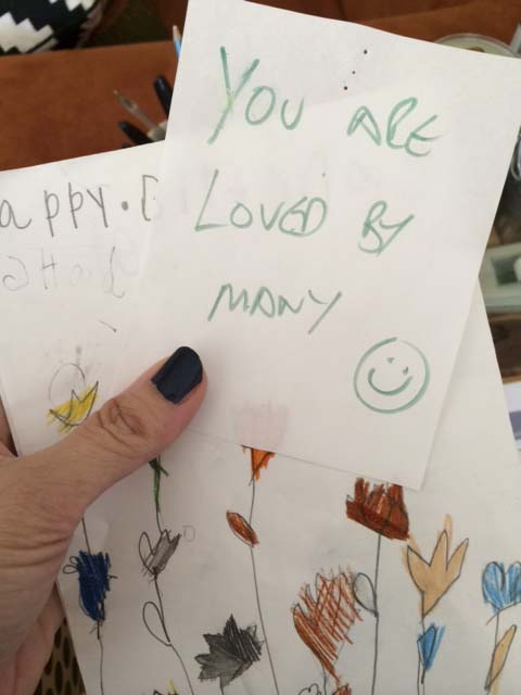 a note that i hadn't really looked at until then. it made me cry. as did the many layers of birthday drawings to me by my children