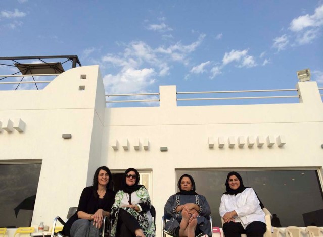 this is me and my fav aunt. my mom and her feet and my aunt who i don't consider an aunt because we used to play together when we were little