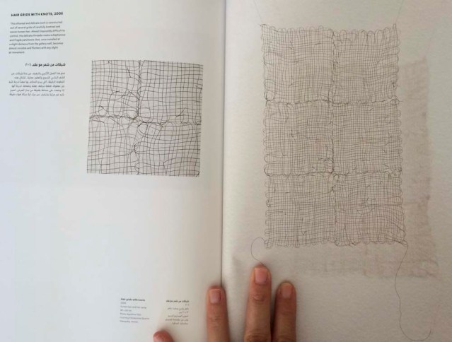 in an attempt to not get too close to hatoum's installation 'impenetrable' i nearly brushed my face against this one, here in her catalog: 'hair grids with knots'. I was so close to it that it actually came off the wall. so intricate and delicate. i wouldn't mind finding this sort of hair in my salad at a restaurant