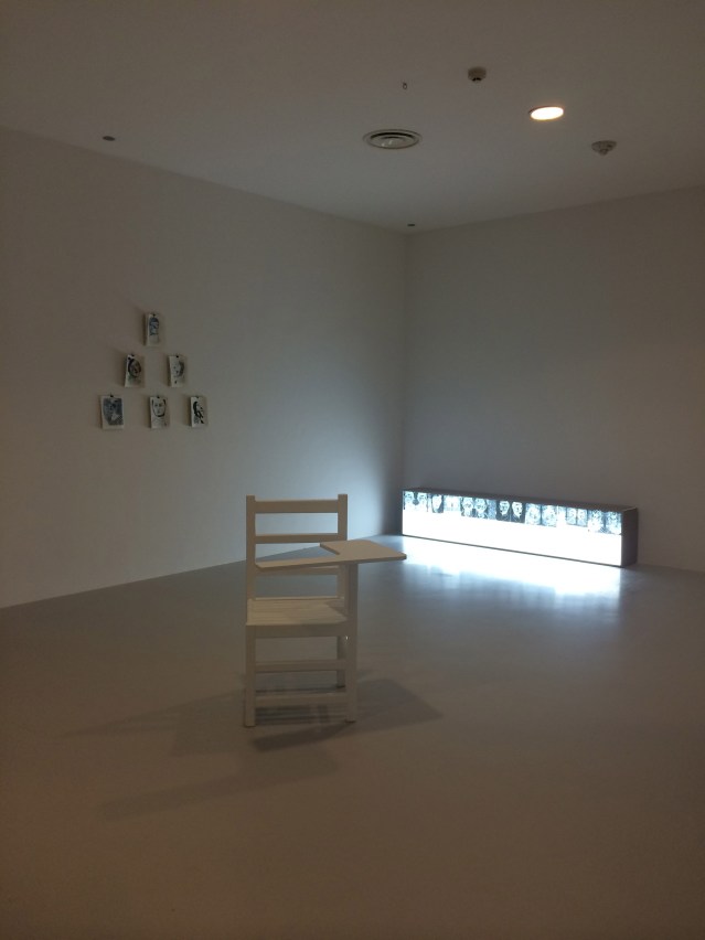 ala's pyramid stacks of drawings, the light box and a seemingly normal chair