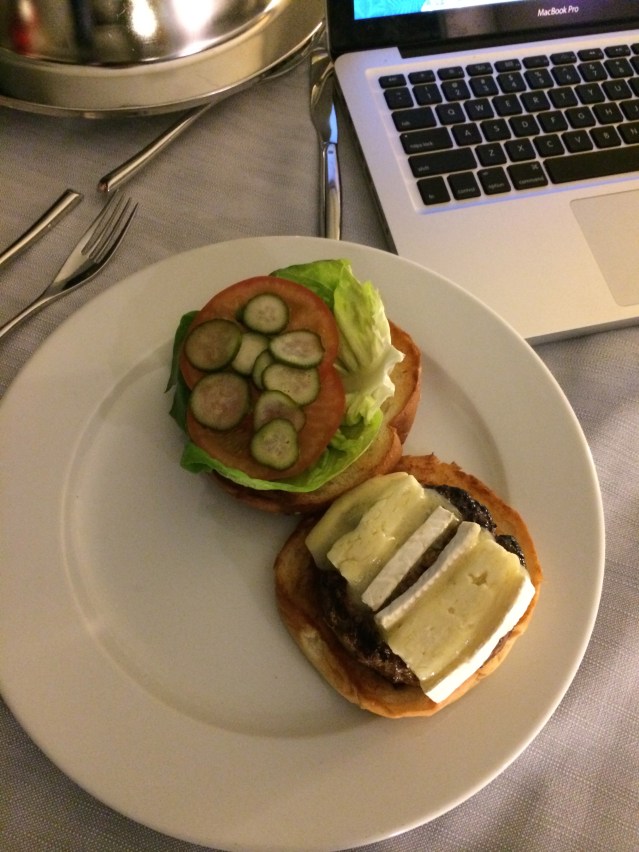 back in the room, it's a market burger for me. medium rare with brie, pickles and truffle mustard. yum!