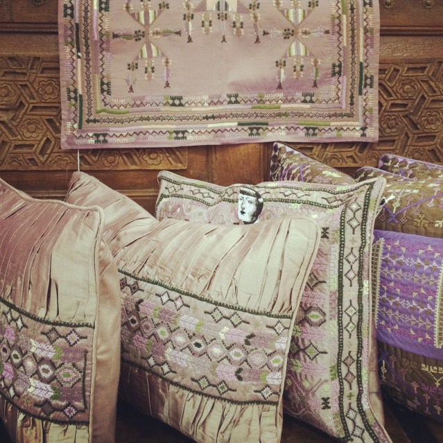 peeping through the lilacs