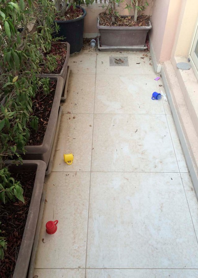 finding things outside. dirty, plastic utensils in my dirty balcony