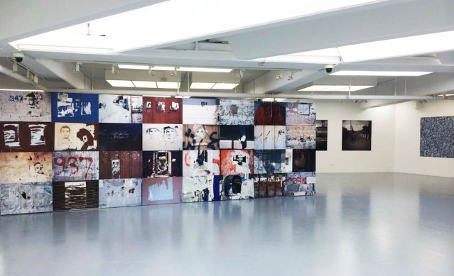 taysir batniji's untitled (gaza walls) is the first installation you see when you walk into the 'keep your eye on the wall' exhibition featuring photographers taysir batniji, rula halawani, raeda saadeh, steve sabella, and kai wiedenhöfer