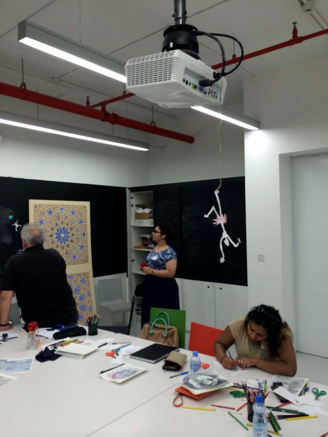 here's dany's crazy chick hanging from the projector. she may still be hanging there