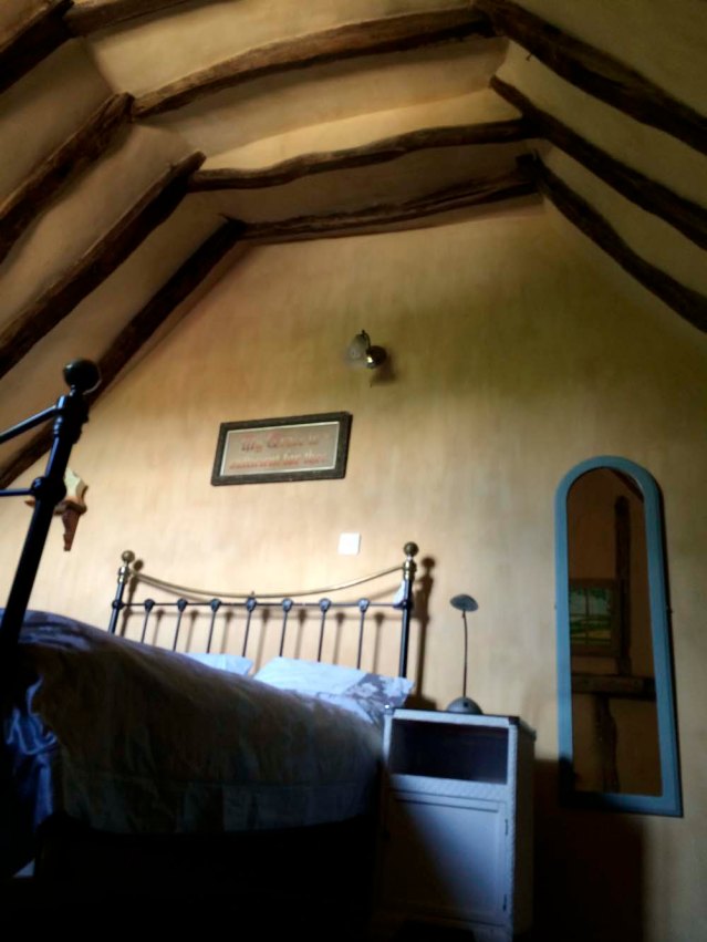 i'll start my tour with the bedroom upstairs. i didn't spend much time up here. i didn't even sleep in this bed (although, believe me, i would have loved to)