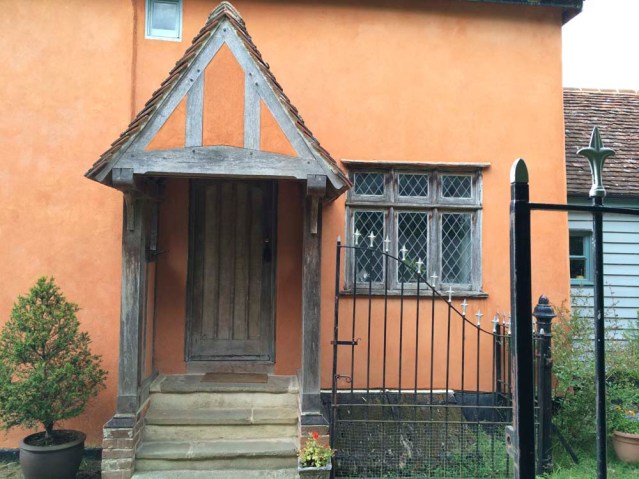 let me introduce you to 'the old monkey': this is the entrance to 'my' cottage. the portico holds so much charm and its share of intricate cobwebs
