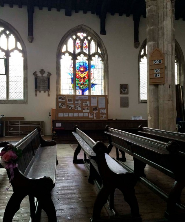 sometimes i would look around. this modern looking stained glass window caught my attention, breaking my attempt at meditation