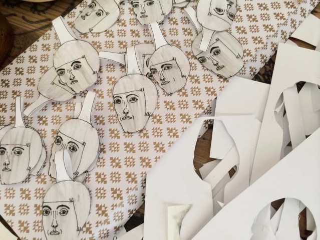 here they are waiting to be strung. or is it stringed? i used zeri crafts paper for some of the backing