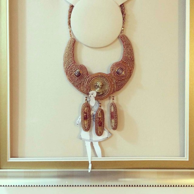 eve and the empire of the sun necklace. she weeds through the beads effortlessly