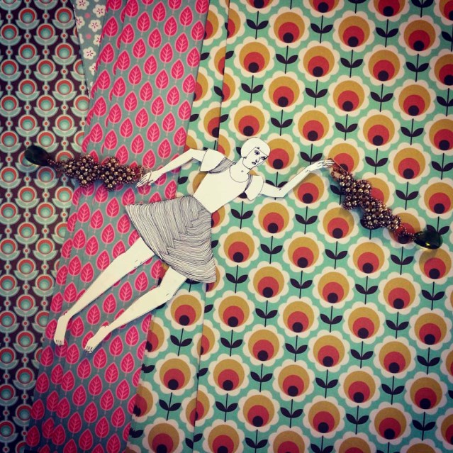 she uses her earrings to fly