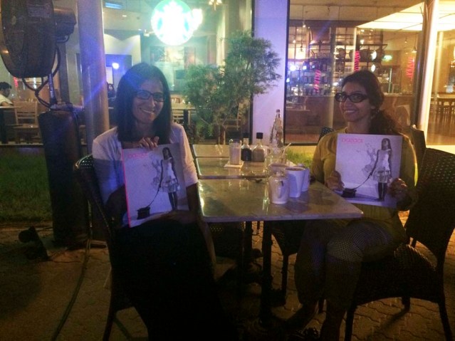 dinner with Maysaa at PQ with glasses and magazines. i finally got to see the hard copy of this month's bazaar 