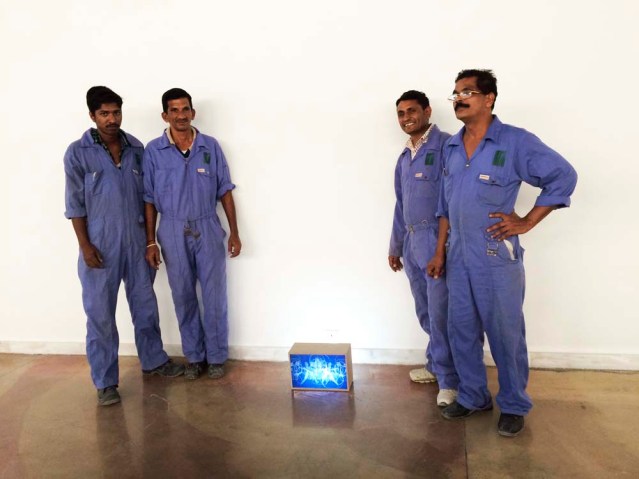 the four men who made my light boxes. thank you, fellas! these guys work really, really hard to realize the dream of one person. seems a little lop-sided in the grand scheme of things