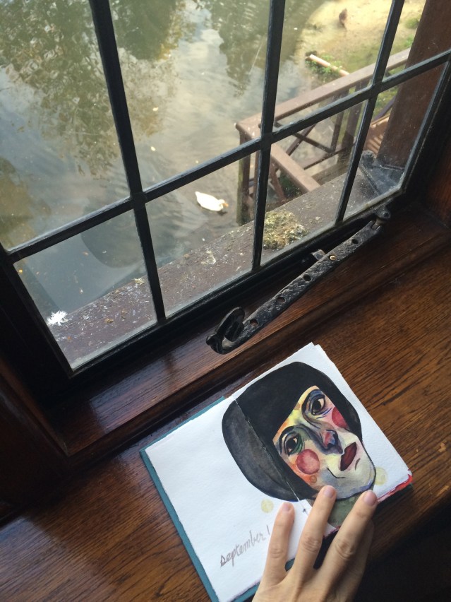 a room with a view, a window sill with a face