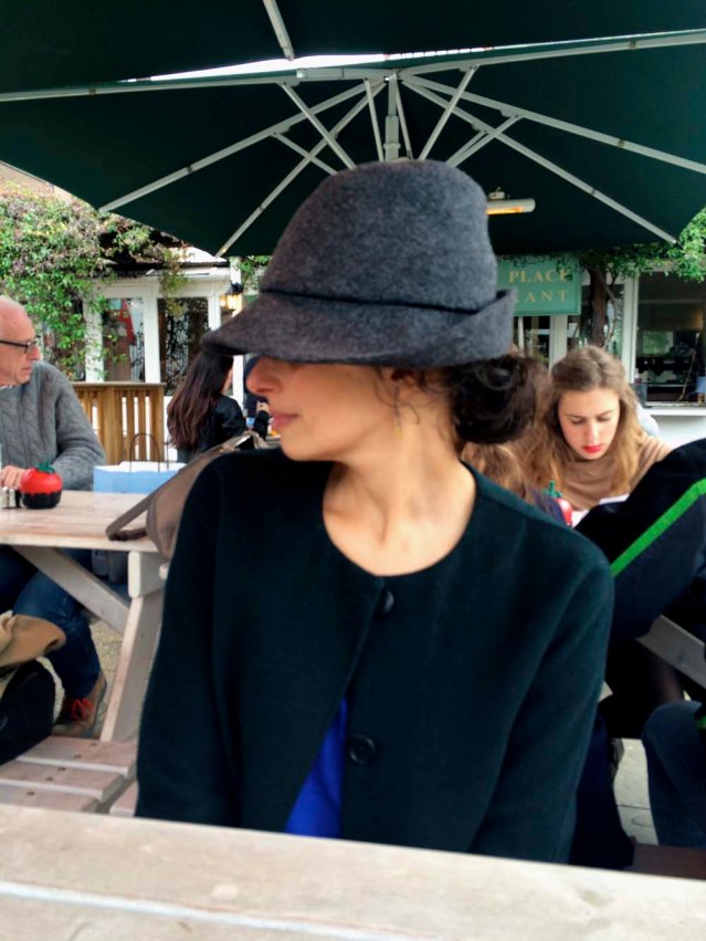 hats become her. sarah looks so elegant