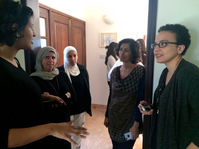 deema (left) explains her 'madeenah' city walks to an attentive huda, laila and farah at zeri crafts