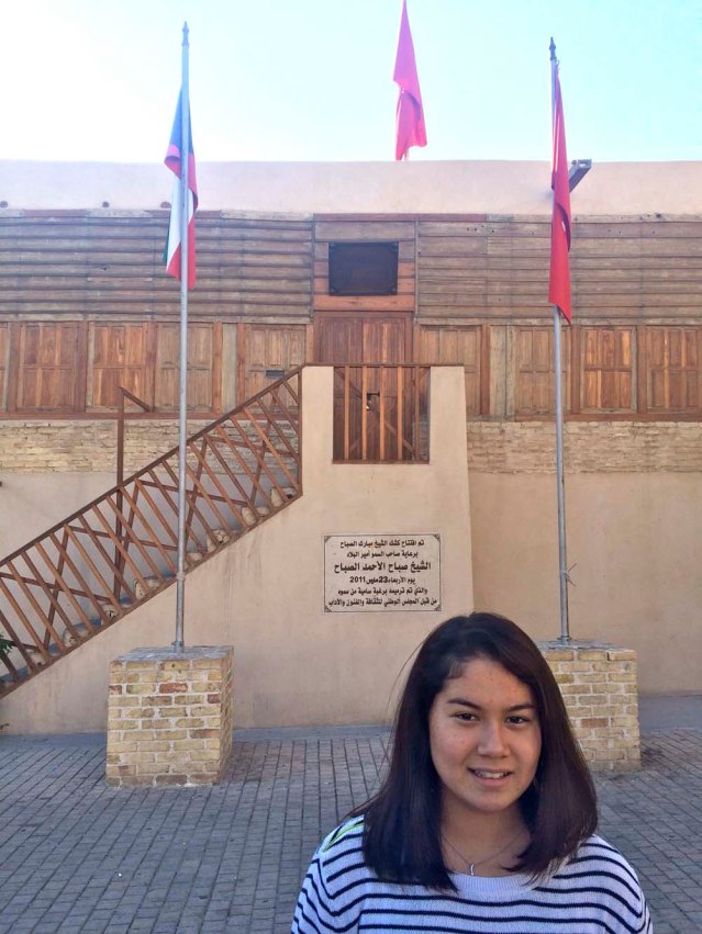 xixi in front of this 'kiosk' dedicated to our emir