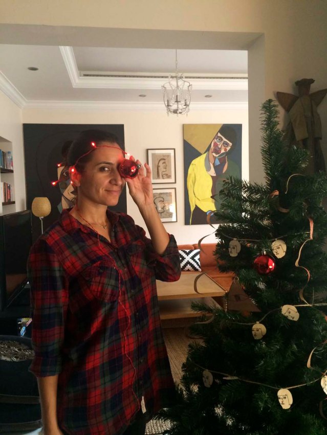 early this morning we FINALLY began decorating for real. oh and ikea sucks for having the shortest twinkle light sets ever. i only bought one so there are currently tent little lights on the tree