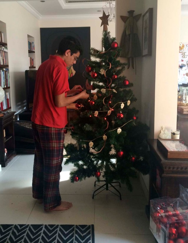 yousef adds a few baubles. actually i think he only hung one