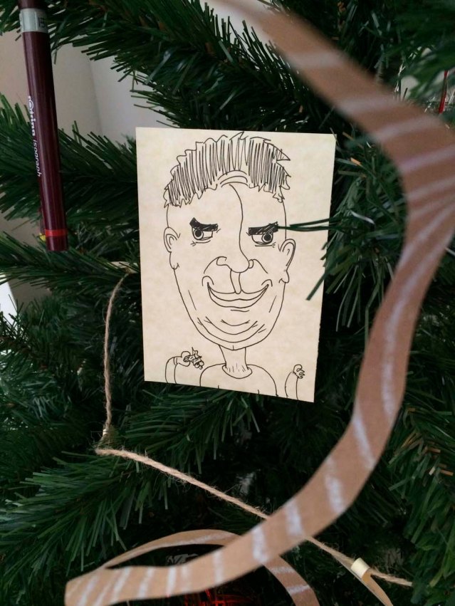 khaled's addition to our tree is this guy holding a sprig of mistletoe