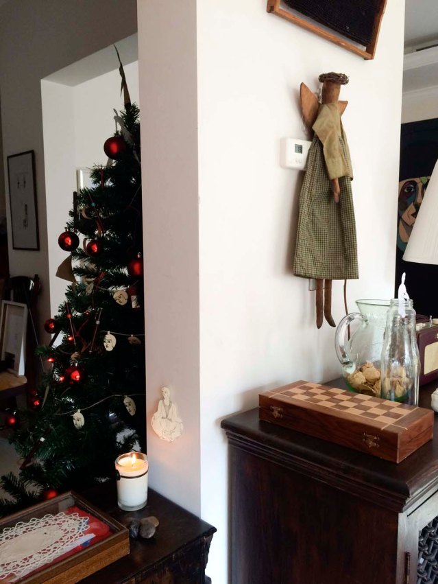 like here. i decided to move this angel over to this wall. it looks so much better in its new location