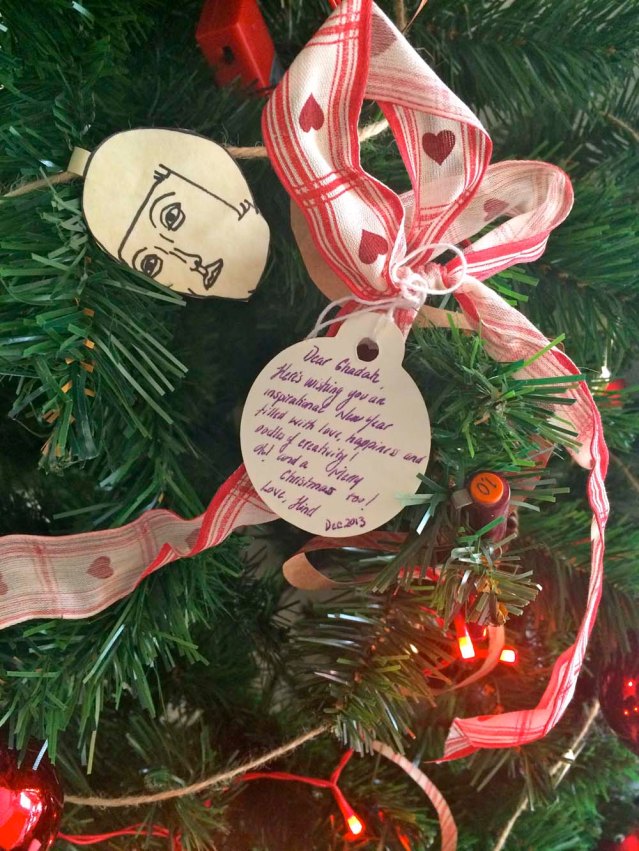 and finally (for today, i can see myself adding to this tree until i take it down) this card and ribbon from a gift i got last christmas