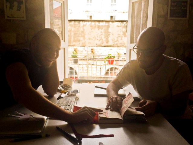 hussein (left) and david look through my journal