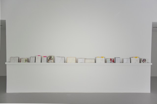 my sketchbooks lined nicely at the project space in doha's mathaf: arab museum of modern art