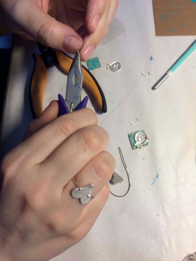 she's already wearing the heart rings she made