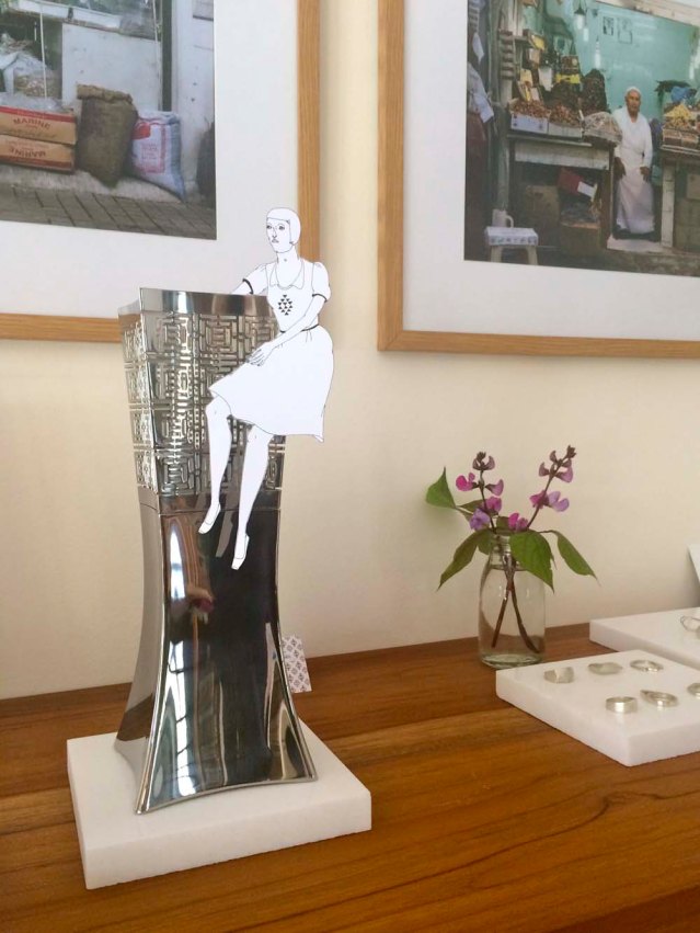 eve tries to climp into nedda el-asmar's silver incense burner