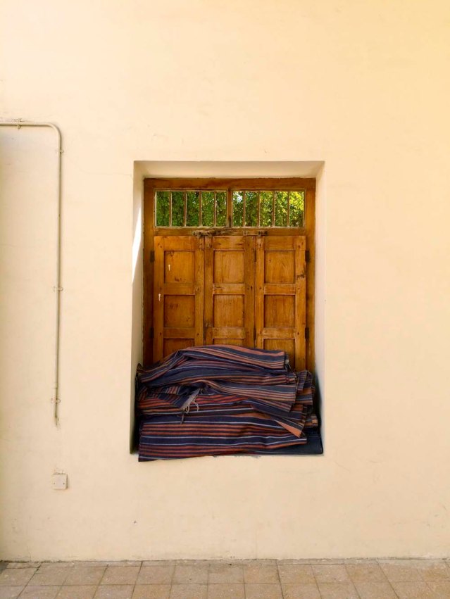 and this beautiful window with traditional rugs. i remember these rugs from the past. my grandparents had them in their homes, my great grandmother...walking around inside these mosques took me back to my childhood when my parents would bring us back to kuwait for the summer
