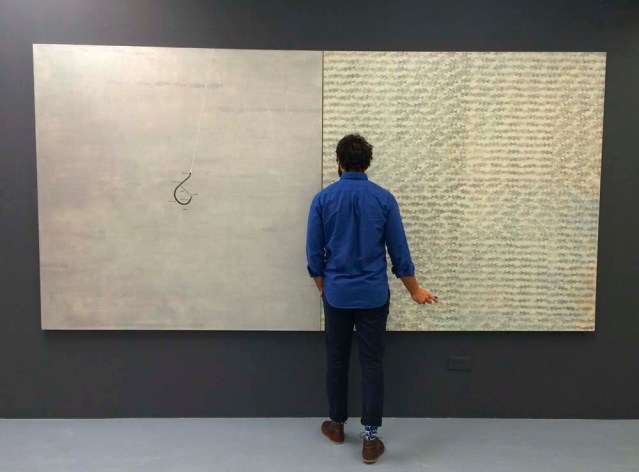 one from my volleyball posse chaker standing a little too close to the fish in yahya's work