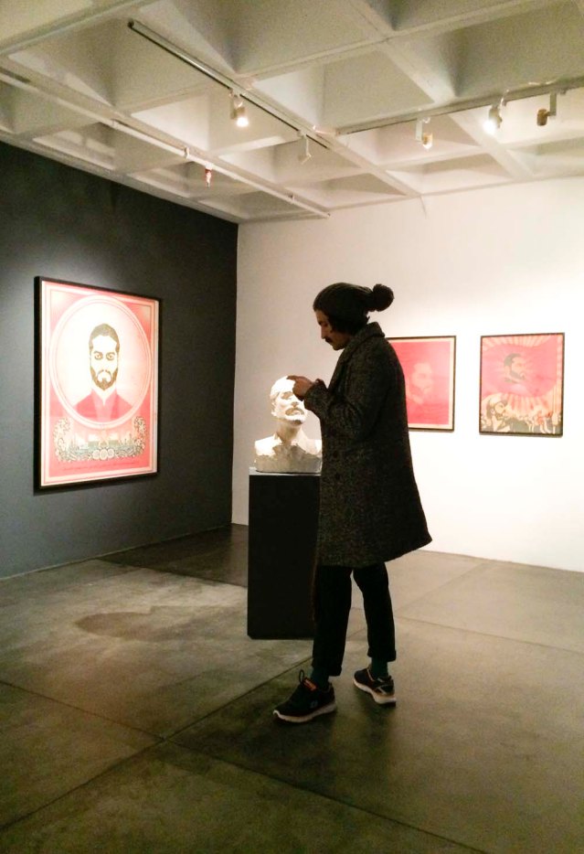 bust of george and the very recognizable sillhouette of basel al-hadi