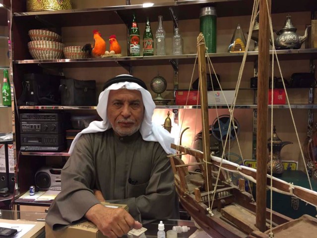 reem took this wonderful photo of this man who sold me the coin. i wish he had more info about his wares though