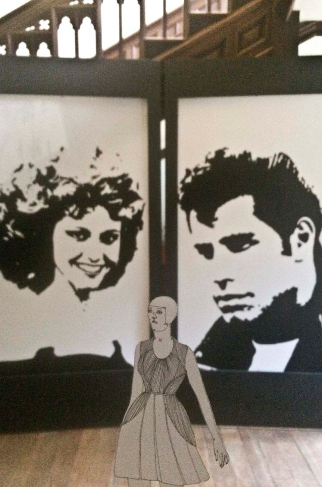 her favorite movie is grease. here she is with olivia and john, aka sandy and johnny