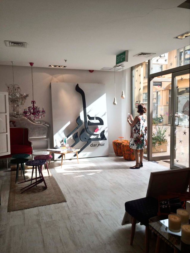 photographing eve. we had a really nice breeze going through the courtyard and into the shop. i love the lighting here