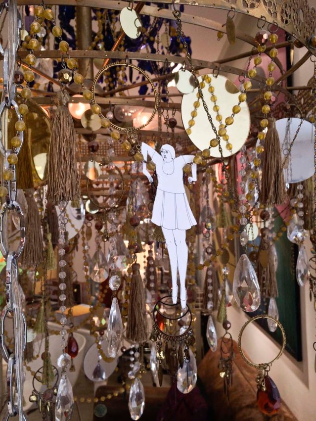 hanging from a beautiful chandelier