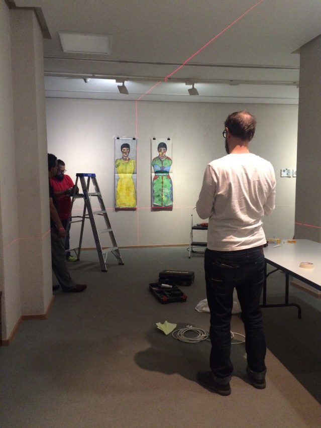 checking the handiwork. yes i think they're as straight as they'll ever get