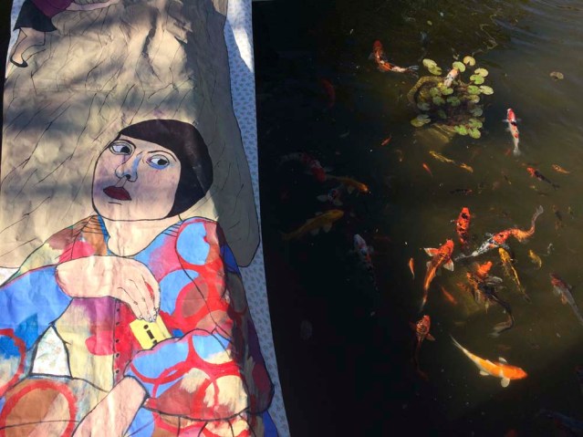 in the garden i fed the fish because i know where the food stash is