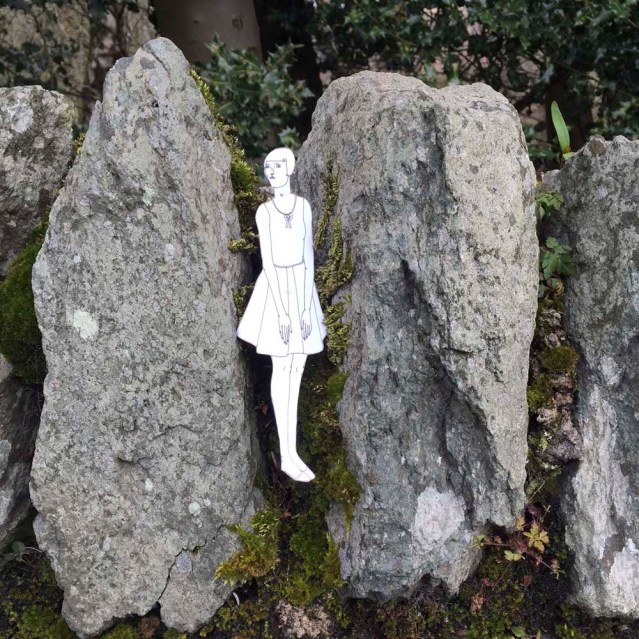 she's caught between a rock and a hard place